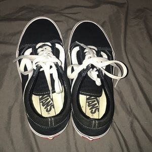 Vans black and white tie shoes size 6.5